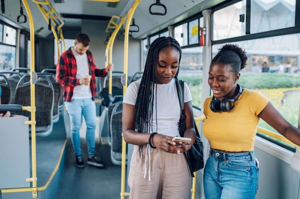 Showing phone on a bus